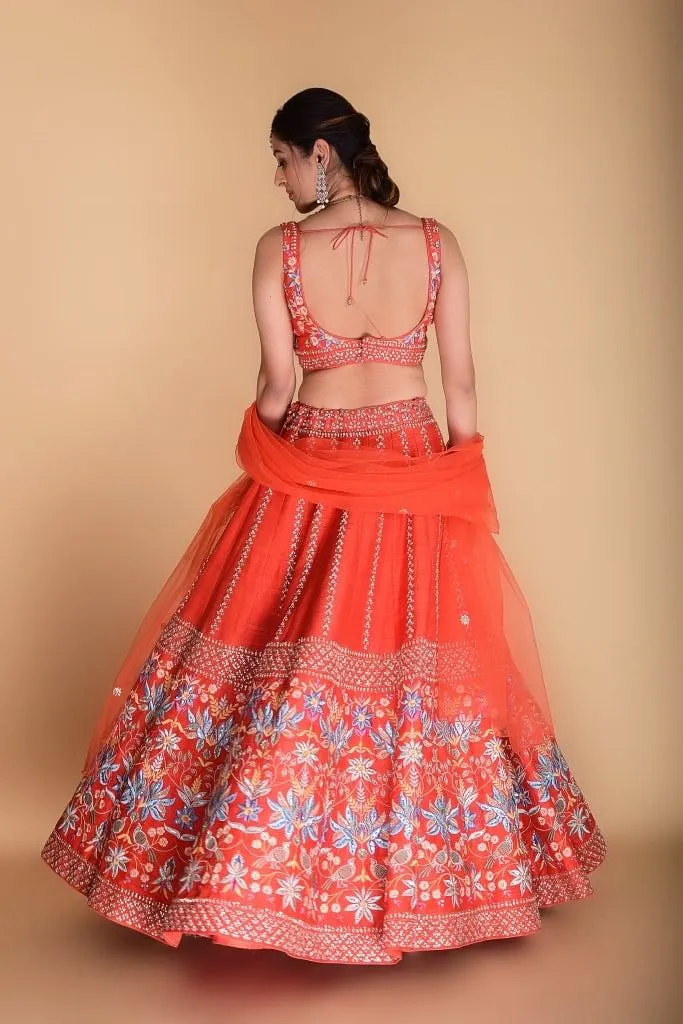 Bright Orange Embroidered Lehenga set.