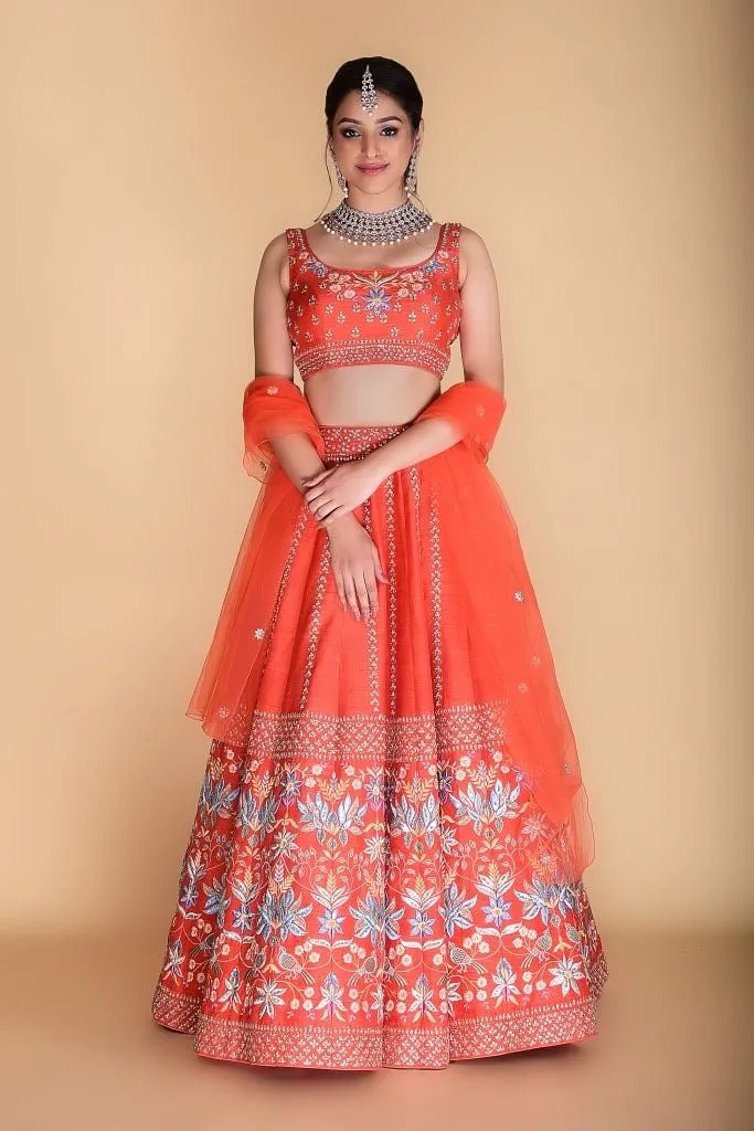 Bright Orange Embroidered Lehenga set.