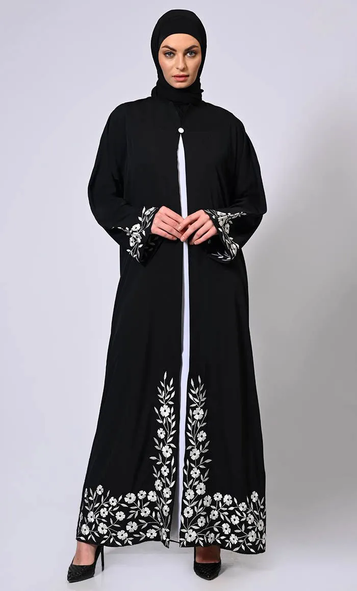 Embroidered Enchantment: Graceful Black Abaya with Delicate Details and Belt - Final Sale