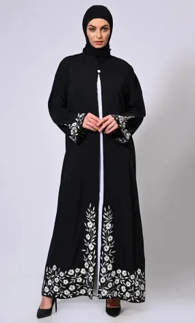 Embroidered Enchantment: Graceful Black Abaya with Delicate Details and Belt - Final Sale