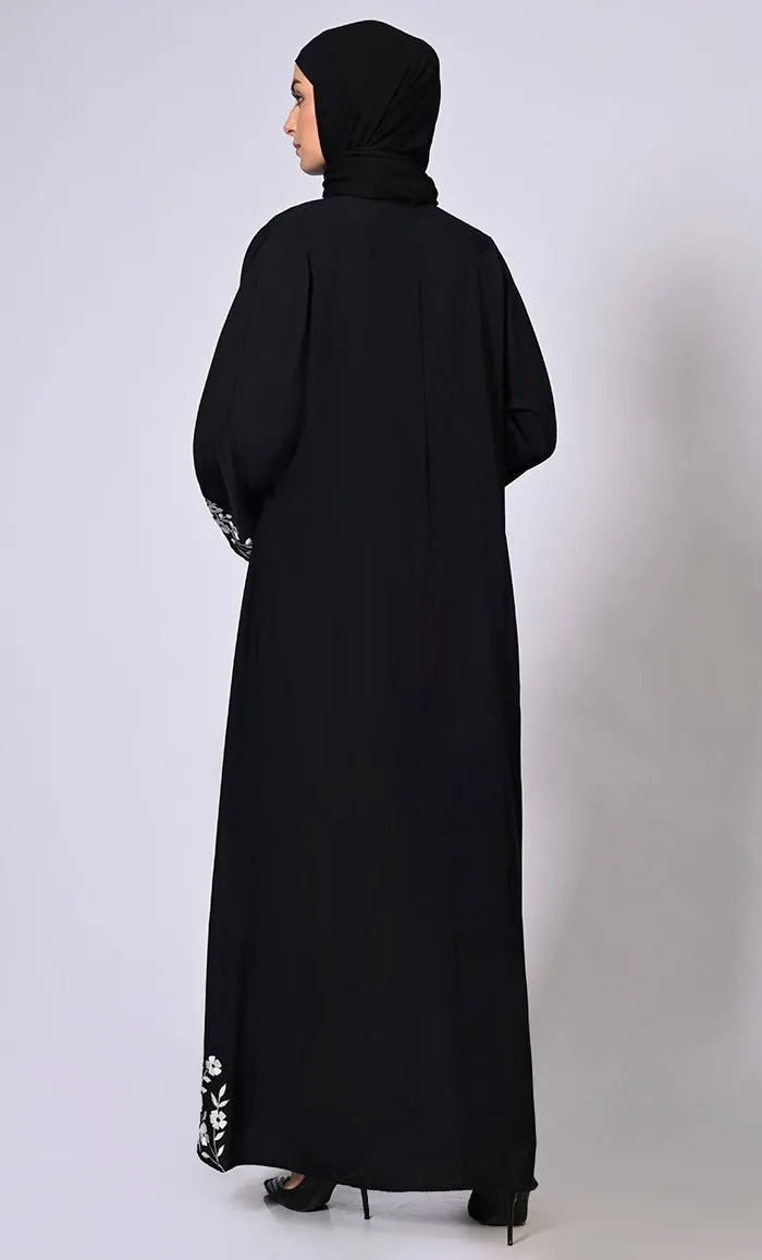 Embroidered Enchantment: Graceful Black Abaya with Delicate Details and Belt - Final Sale